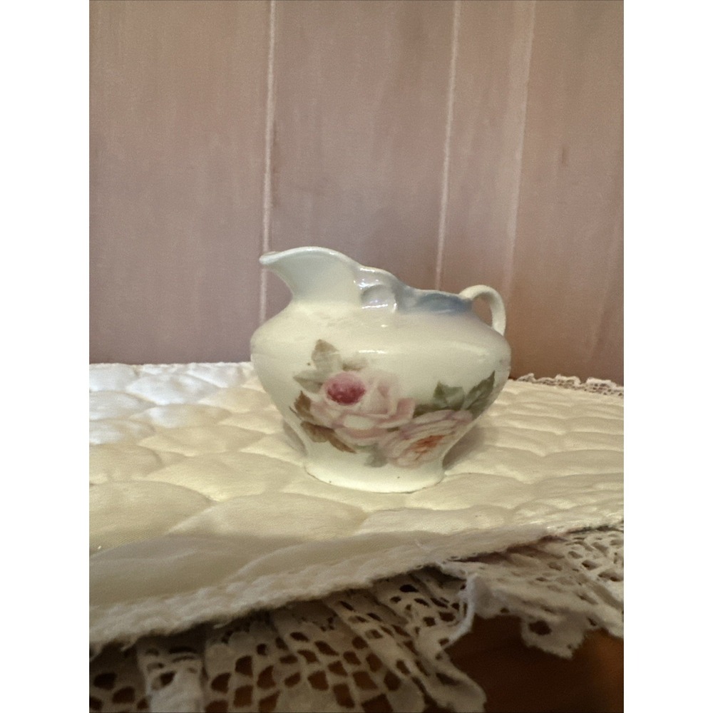 antique porcelain creamer, Made‎ In Germany hand-painted roses and gold trim.